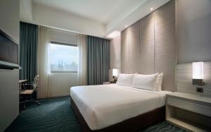 Uma cama ou camas num quarto em Sunway Putra Hotel Kuala Lumpur
