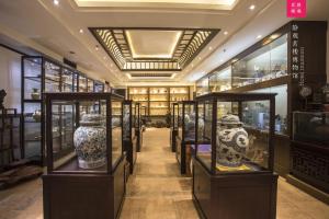 Зображення з фотогалереї помешкання Aroma Tea House Former Jing Guan Ming Lou Museum Hotel у місті Ґуйлінь