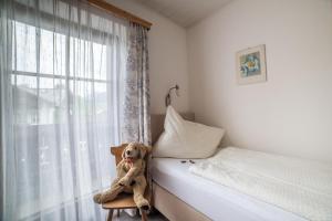 Postel nebo postele na pokoji v ubytování Appartements Millinger