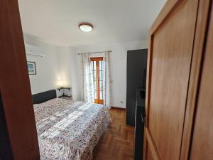 Postel nebo postele na pokoji v ubytování Casa Le Rondini