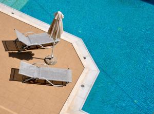 المسبح في Nautilus Bay Hotel أو بالجوار