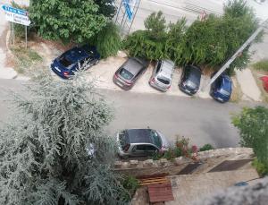 an overhead view of cars parked in a parking lot at Samaya in Agigea