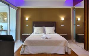 Кровать или кровати в номере Sofouli Suites