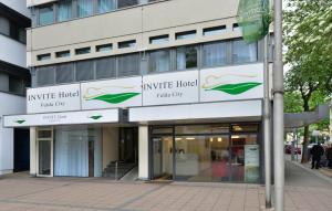 a building with a sign for a field city at INVITE Hotel Fulda City Hauptbahnhof in Fulda +15 photos