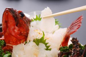 a plate of food with a fish and broccoli at Seaside Culinary Inn "Masaemon" - Traditional Dinner & Breakfast Included in Minamiboso