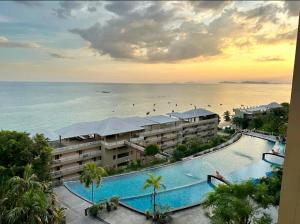 an aerial view of a resort with a swimming pool at Royal Phala Cliff Beach Resort in Ban Chang