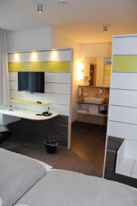 Postel nebo postele na pokoji v ubytování Hotel Ripken