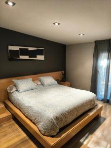 Ένα ή περισσότερα κρεβάτια σε δωμάτιο στο Apartamento con encanto