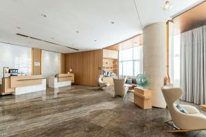 A seating area at Fairfield by Marriott Shanghai Hongqiao