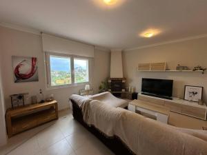 Telewizja i/lub zestaw kina domowego w obiekcie Villa Maja Calpe