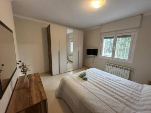 Łóżko lub łóżka w pokoju w obiekcie Villa Maja Calpe