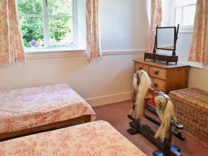 a bedroom with two beds at The Old Mill in Bucks Mills +13 photos