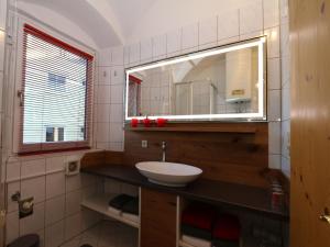 A bathroom at Apartment building, Fügen