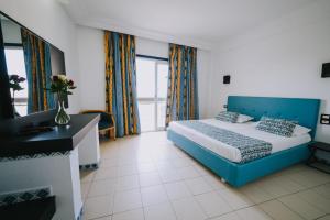 Ένα ή περισσότερα κρεβάτια σε δωμάτιο στο HOTEL KAISER