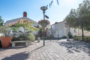 Zahrada ubytování Maison de bourg pour 4 à 500m de la mer