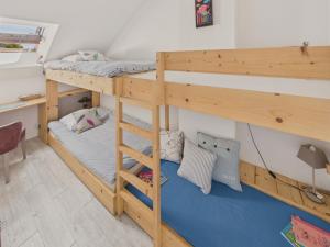 Ένα ή περισσότερα κρεβάτια σε δωμάτιο στο 200m plage - duplex pour 2 adultes, 2 enfants