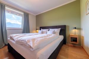 En eller flere senge i et værelse på Haus Alpspitzblick Harmonie