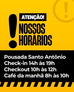 ein Schild mit der Aufschrift „Nosos Horatio Hamburgoscheck in as“ in der Unterkunft Pousada Santo Antônio Tiradentes 400m Maria Fumaça 2º Andar in Tiradentes