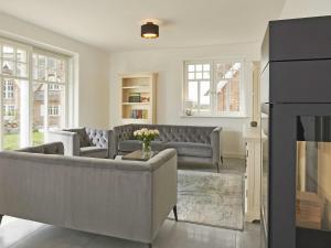 Khu vực ghế ngồi tại Strandhaus "Oie" in Lobbe mit Meerblick, Kamin, Sauna +24 ảnh