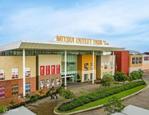 a building with a music district outlet park at Hm home in Sepang