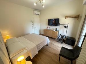 TV a/nebo společenská místnost v ubytování BnB Montepulciano + 61 fotografií