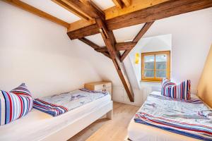 Postel nebo postele na pokoji v ubytování Gutshof Lesch - Ferienwohnung 1