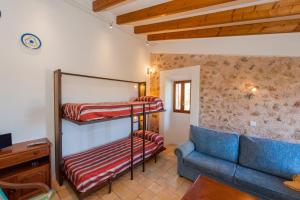 Postel nebo postele na pokoji v ubytování Finca Hotel Ses Cases Noves