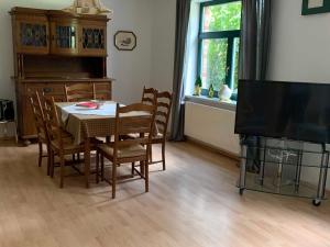 Posezení v ubytování Gemütliches Ferienhaus in Barlin, unweit Dargun