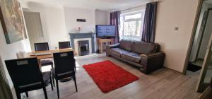 TV a/nebo společenská místnost v ubytování Ensuite Room