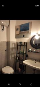 Koupelna v ubytování Giulietta Rooms + 23 fotografií