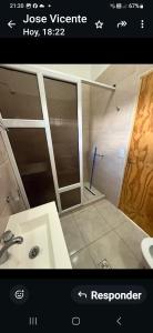 a picture of a bathroom with a sink and a mirror at Acordes de Gaitas dpto3 in Malargüe +9 photos