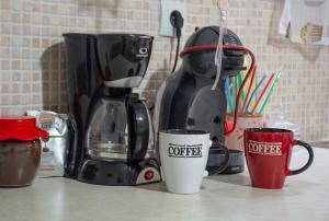 Příslušenství pro přípravu čaje a kávy v ubytování Depi's Home