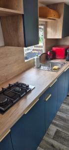 Køkken eller tekøkken på Przyczepa Holenderska POCO + 14 billeder