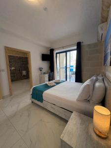 Φωτογραφία από το άλμπουμ του Fiftyfour West Boutique Living σε Għarb