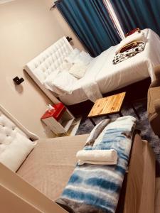 Ένα ή περισσότερα κρεβάτια σε δωμάτιο στο Forest Home Accommodation