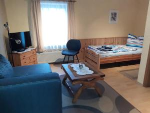 Ένα ή περισσότερα κρεβάτια σε δωμάτιο στο Urlaub bei Monsieur Pigard 42001