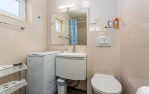 Koupelna v ubytování Apartman Sunshine Njivice Krk by Villas Guide