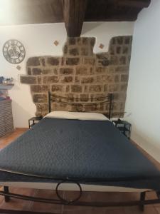 Ένα ή περισσότερα κρεβάτια σε δωμάτιο στο Bagnaia Suite