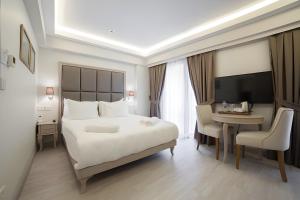 Cama ou camas em um quarto em Perla Galata Hotel