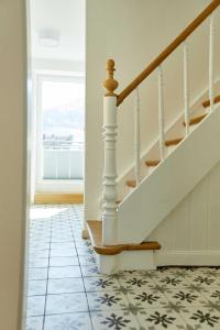 a staircase in a house with a tile floor at NEU!!! Moselbleibe Ferienhaus 1903 in Bernkastel-Kues