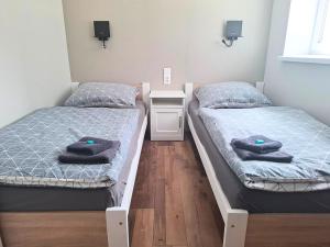 Posteľ alebo postele v izbe v ubytovaní Dimael Hostel & Apartments