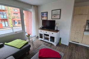 Televisyen dan/atau pusat hiburan di Olandblick, Wohnung i Hus in Lee