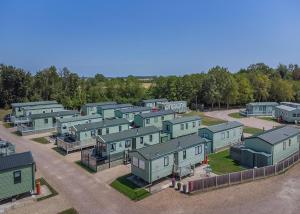 an aerial view of a row of houses at Herons Mead Lodges in Orby