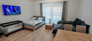 Postel nebo postele na pokoji v ubytování Nový Apartmán Na Grůsce Strážnice u Baťáku