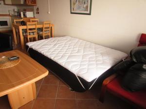 Ein Bett oder Betten in einem Zimmer der Unterkunft Apartment 255