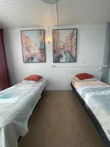 Postel nebo postele na pokoji v ubytování PENTHOUSE SEASIDE 10 MIN port, croisière et aéroport