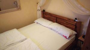 Ein Bett oder Betten in einem Zimmer der Unterkunft Ferienwohnung Mattejiet