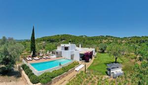 an aerial view of a villa with a swimming pool at Luxury 9 Bedroom Villa in Ibiza City, 1250 in Sant Carles de Peralta