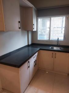 Η κουζίνα ή μικρή κουζίνα στο 10C Apartment