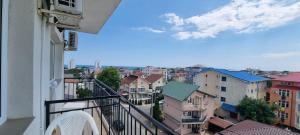 a view of a city from a balcony at Hotel Blue Sky Resort in Eforie Nord